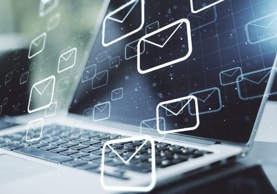 Creative abstract postal envelopes sketch on modern laptop background, e-mail and marketing concept. Double exposure Creative abstract postal envelopes sketch on modern laptop background, e-mail and marketing concept. Double exposure